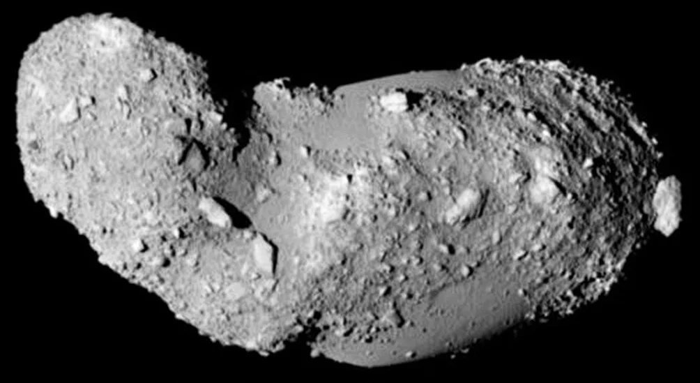 Image of asteroid Itokawa (Credit: JAXA). Notice that the surface has many large boulders. The one on the right seems to be just sitting there.