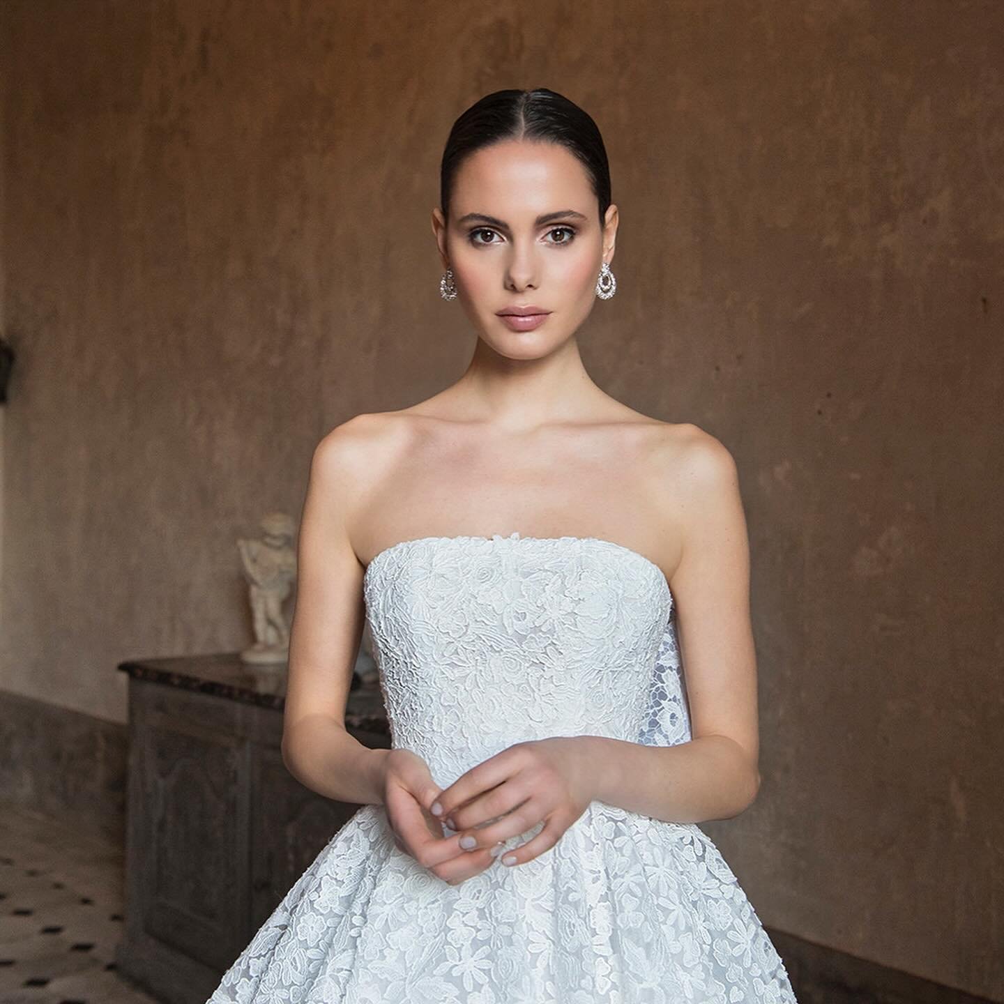 NADINE 🤍 Peter Langner&rsquo;s &ldquo;Nadine&rdquo; gown tells the story of timeless elegance. 
⠀⠀⠀⠀⠀⠀⠀⠀⠀
&ldquo;Nadine&rdquo; is strapless crinoline ball gown, entirely hand-embroidered with guipure lace flowers, cut form the lace fabric and sewn o