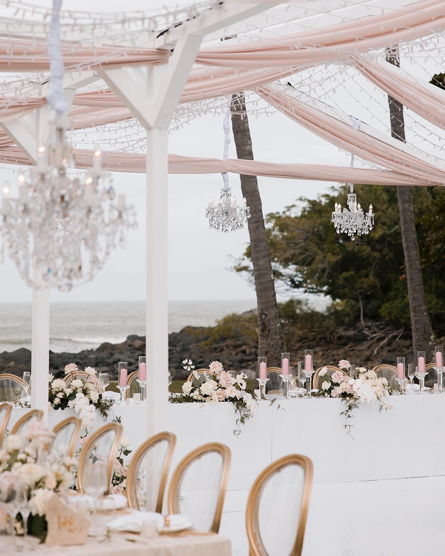 TROPICAL GLAMOR 🤍 Adoring the juxtaposition of the tropical Port Douglas backdrop and ultra glamours styling of Nicole &amp; Alex&rsquo;s wedding 💎 
⠀⠀⠀⠀⠀⠀⠀⠀⠀
Perfectly put together by @alysiabridgerevents &amp; @floralsandco 
⠀⠀⠀⠀⠀⠀⠀⠀⠀
Gown: bespo