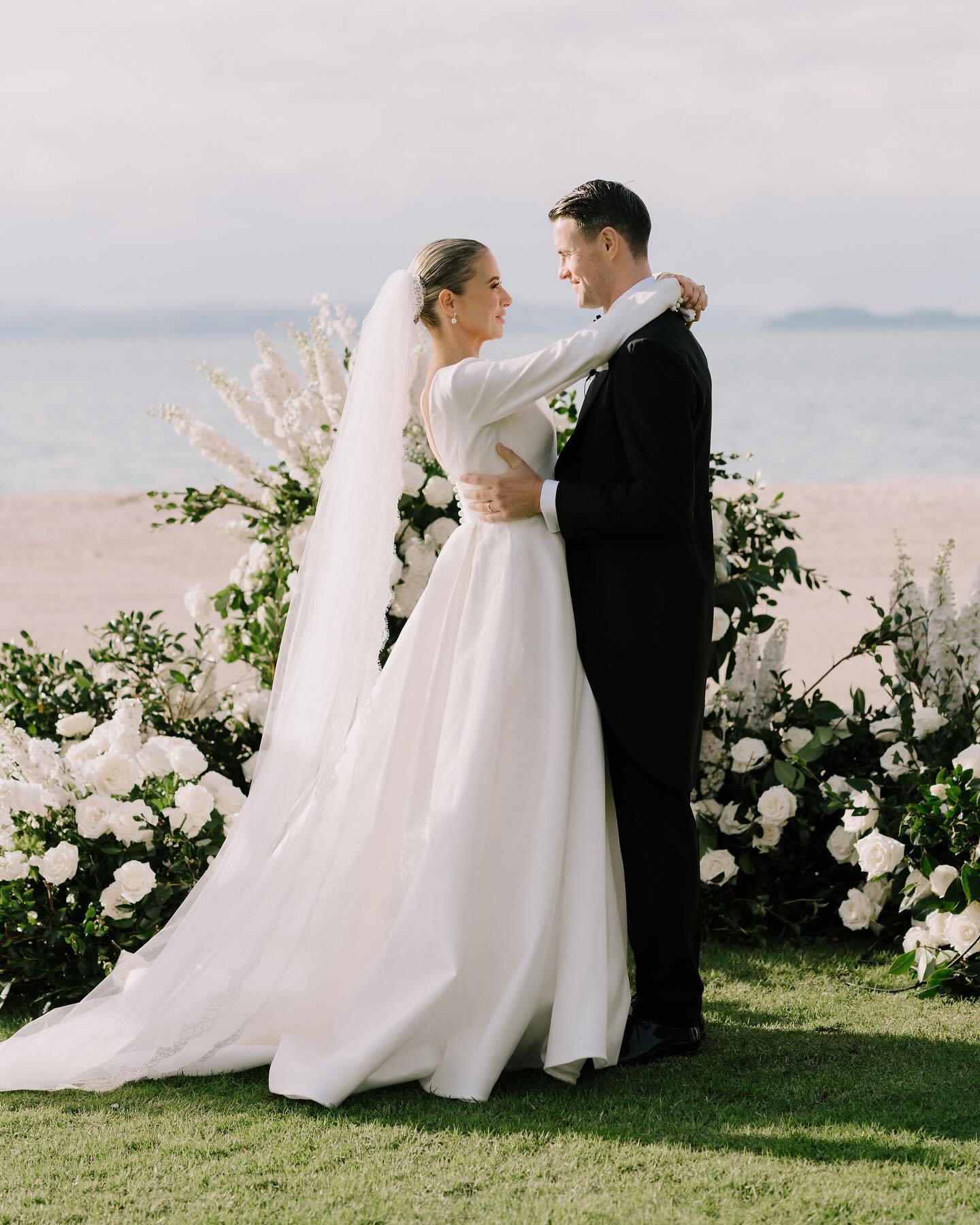 HAPPY ANNIVERSARY 🤍 Lydia chose to work with our amazing stylists to create her dream demi-bespoke Suzanne Neville gown, which she chose to pair with a delicate lace veil by Peter Langner Milano. 
⠀⠀⠀⠀⠀⠀⠀⠀⠀
The ultimate timeless chic look for an exq