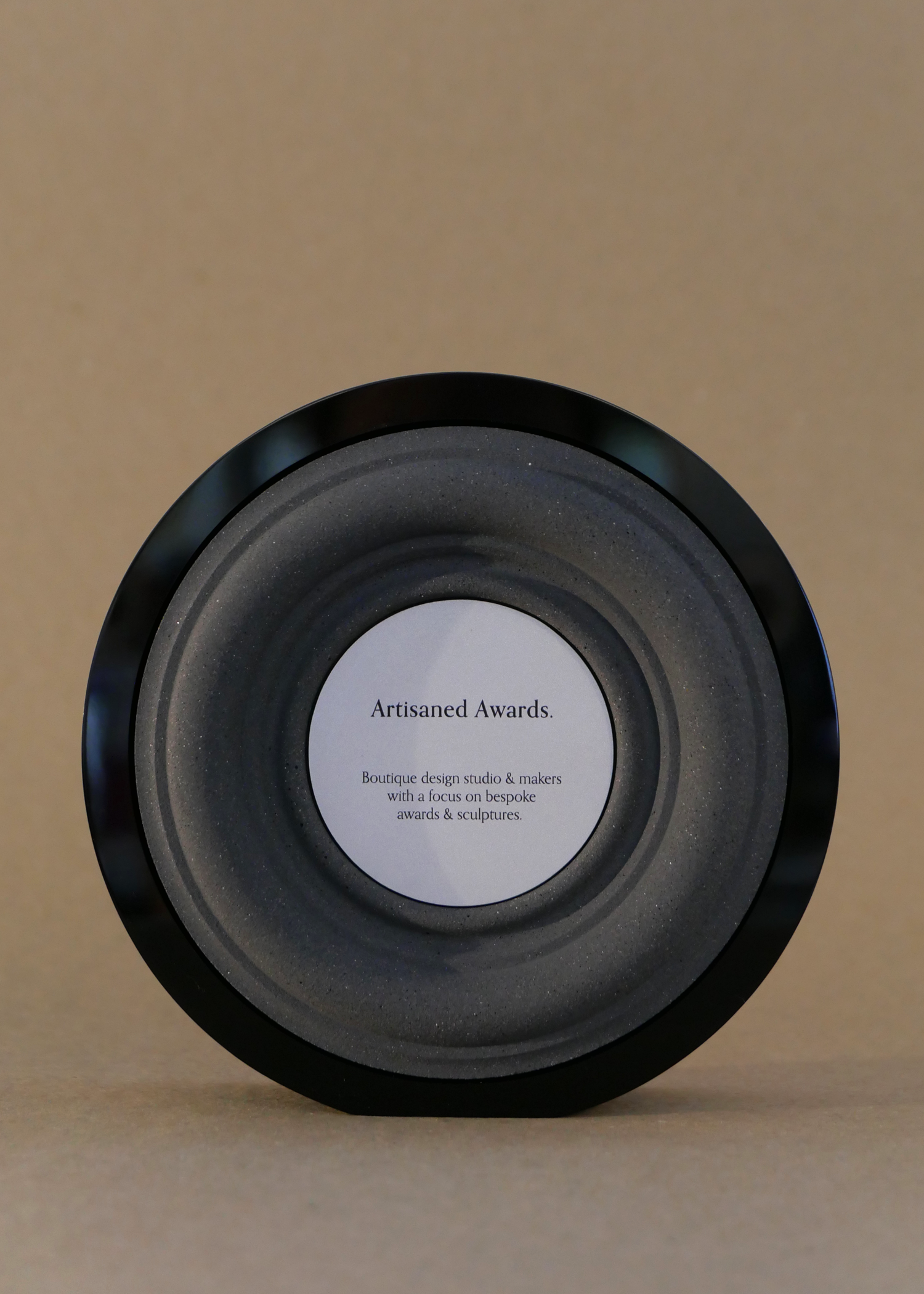 Baroque core design, black gloss acrylic surround, charcoal core finish & bead blasted aluminium plaque.