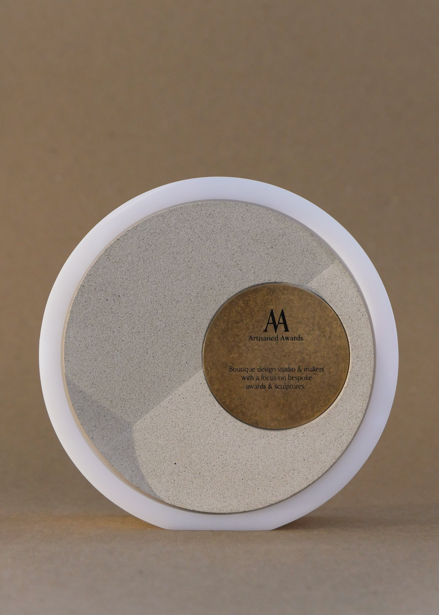 Fold core design, white gloss acrylic surround, beige core finish & aged brass plaque.