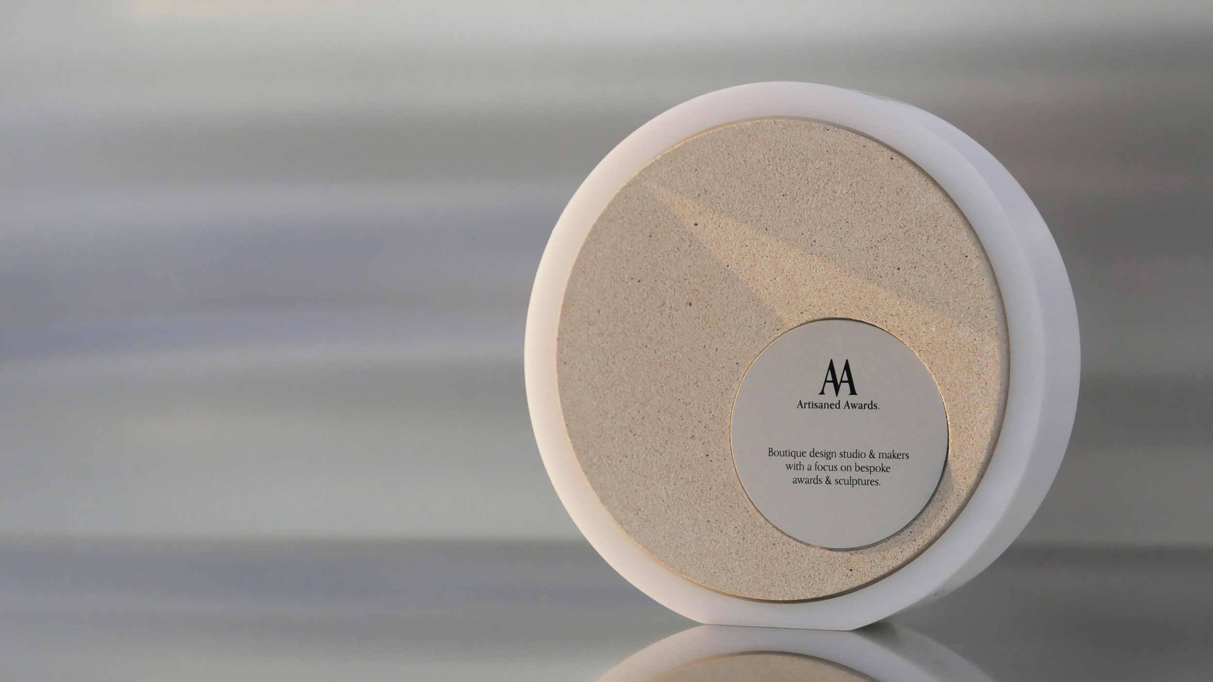 Ledge core design, white acrylic surround, sand core finish & bead blasted aluminium plaque.