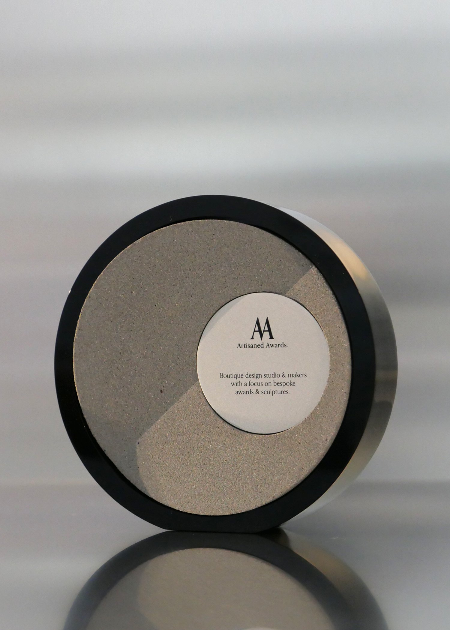Fold award design, black gloss acrylic surround, warm grey core finish & bead blasted aluminium plaque.