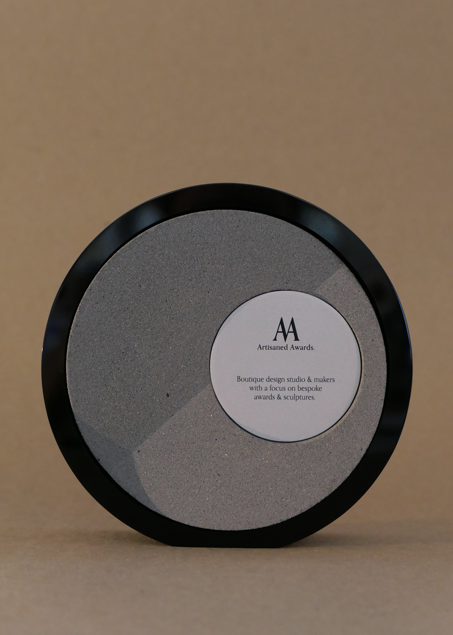 Fold core design, black gloss acrylic surround, warm grey core finish & bead blasted aluminium plaque.