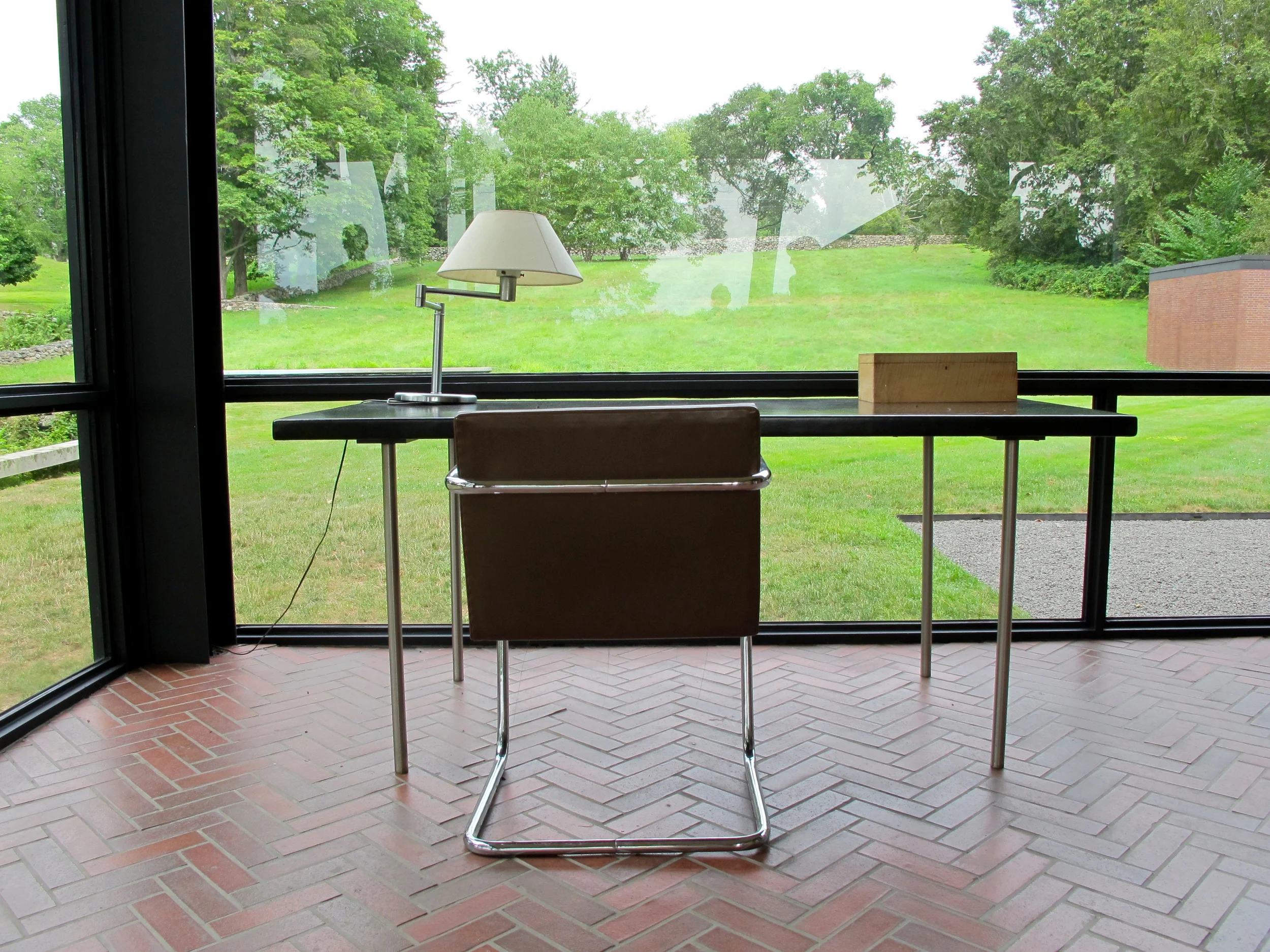 The Study: Ludwig Mies van der Rohe Writing table, 1930; Ludwig Mies van der Rohe Brno tubular chair, 1929; Walter von Nessen Swing-arm table lamp, 1927