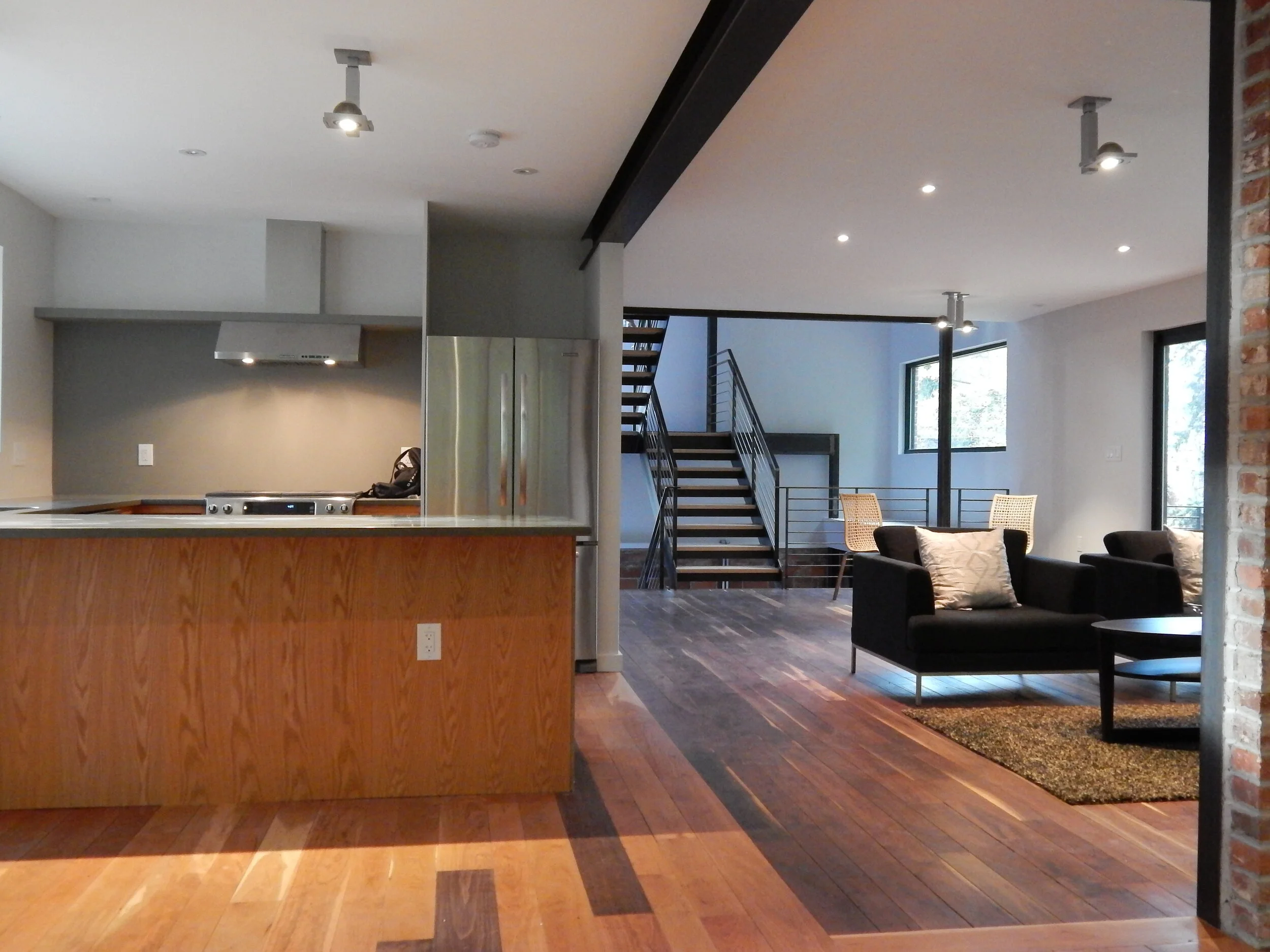 NEW STAIR VIEW FROM  OPEN KITCHEN 