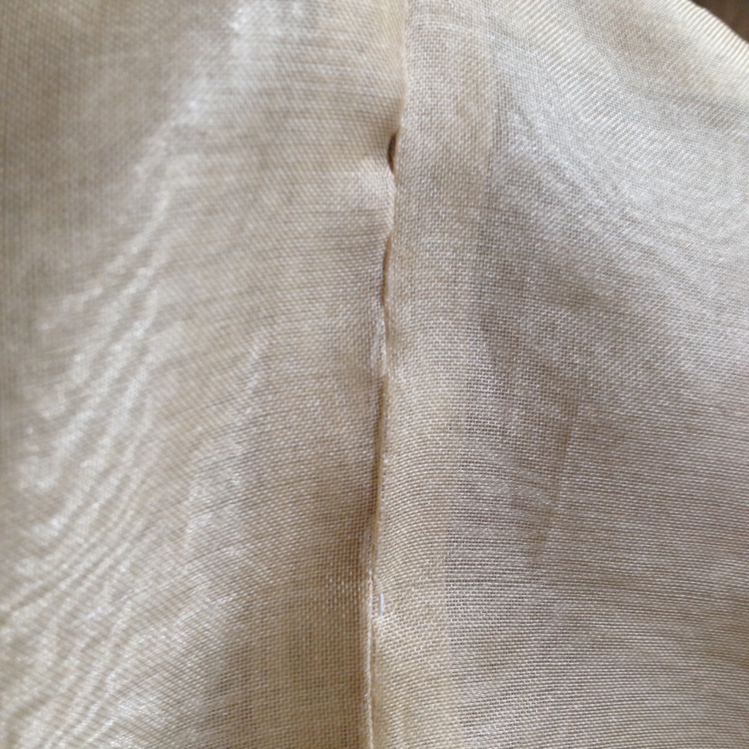 seams butted up to each other and slip stitched together