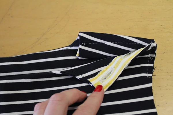 I used the grosgrain ribbon to line the button plackets at the shoulder and on the sleeves.