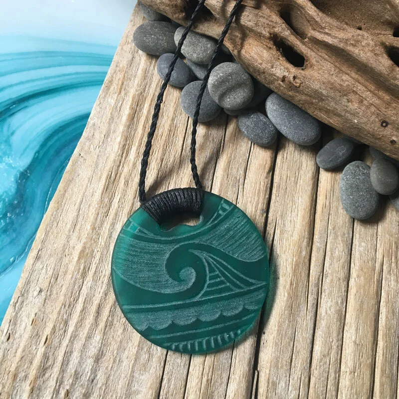 Engraved-glass-moana---wave-design-round-pendant-$76-.jpg