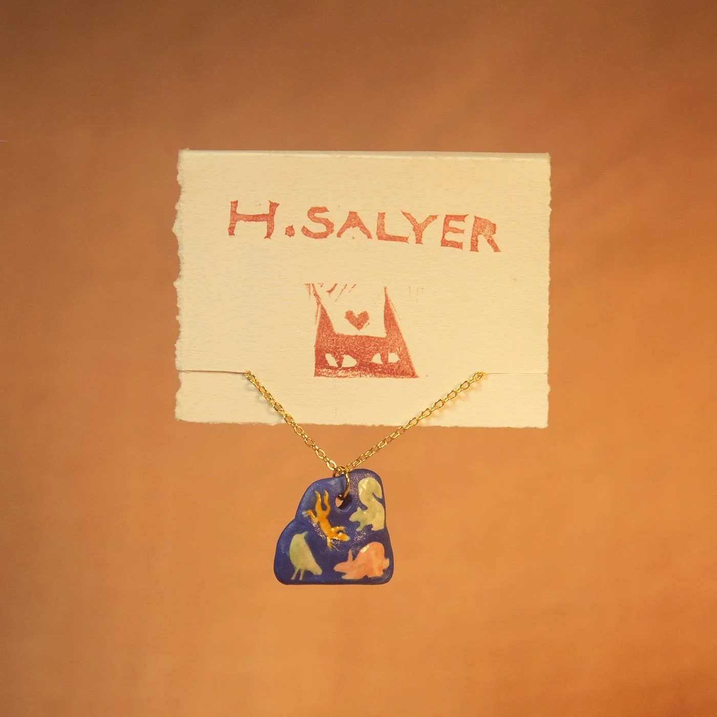 blue chunky animals necklace.jpg