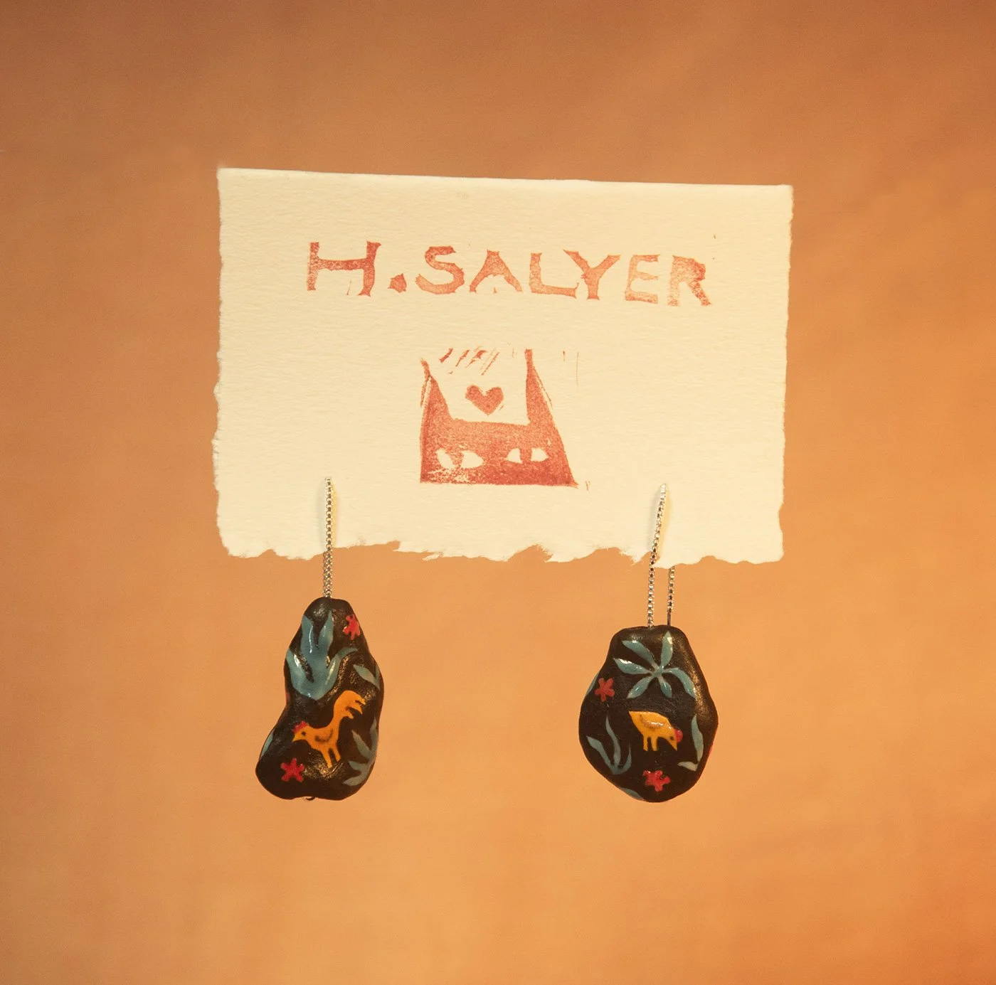 tropical chicken earrings.jpg