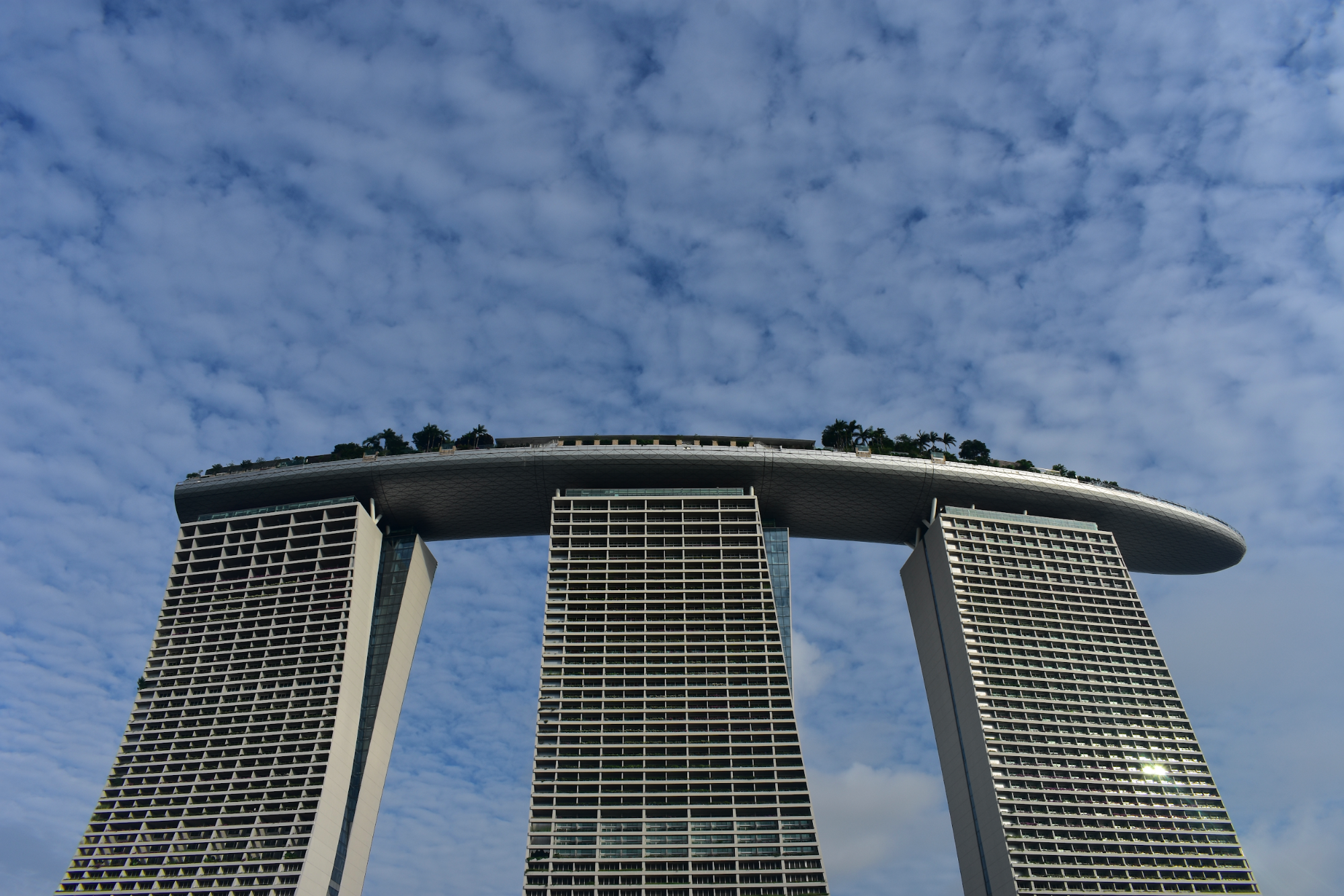 The Marina Bay Sands Hotel, which features a beautiful club, pool and panoramic views of the city