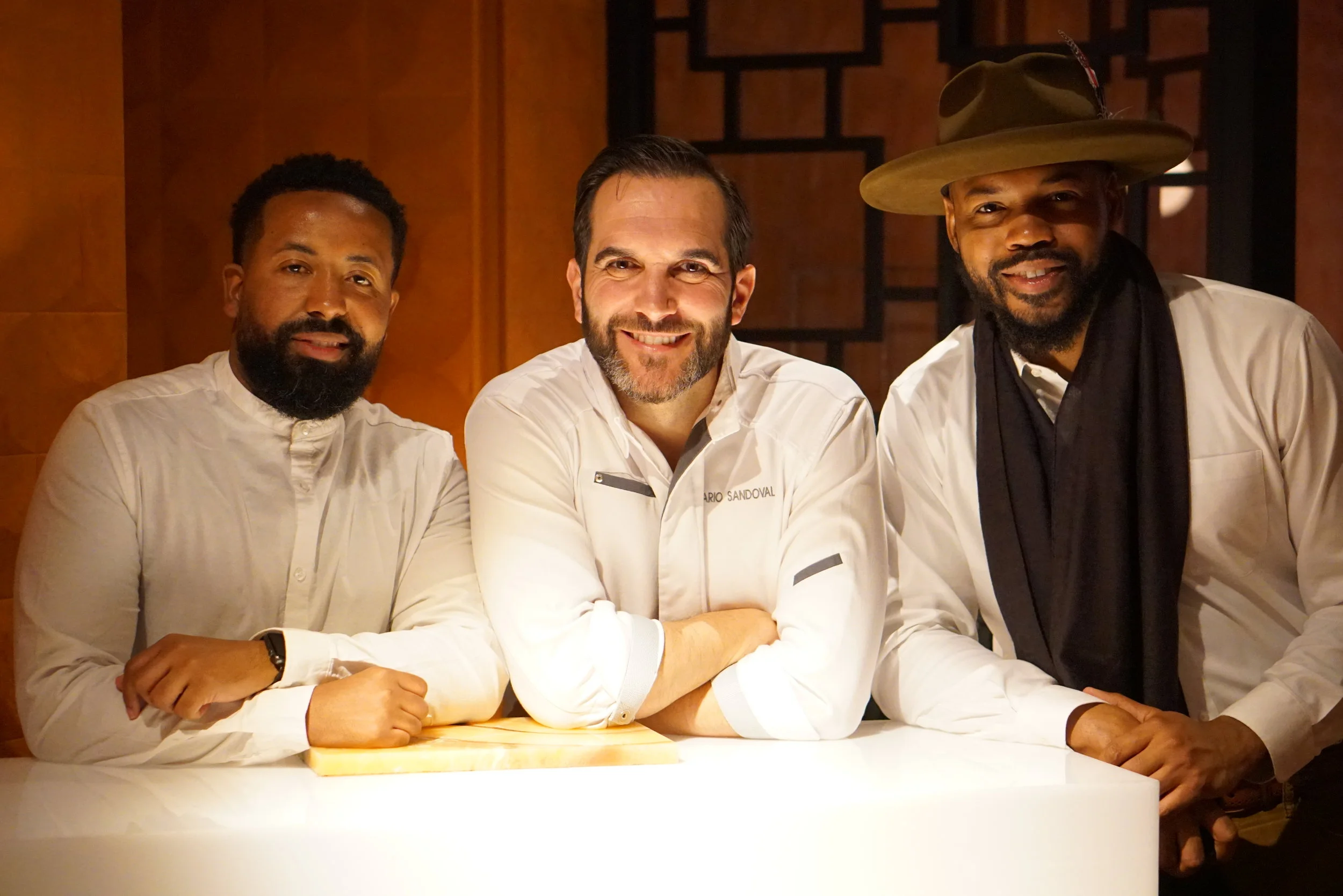 From left: Kent Johnson of Black & Abroad, Chef Mario Sandoval of Coque & Eric Martin of Black & Abroad.