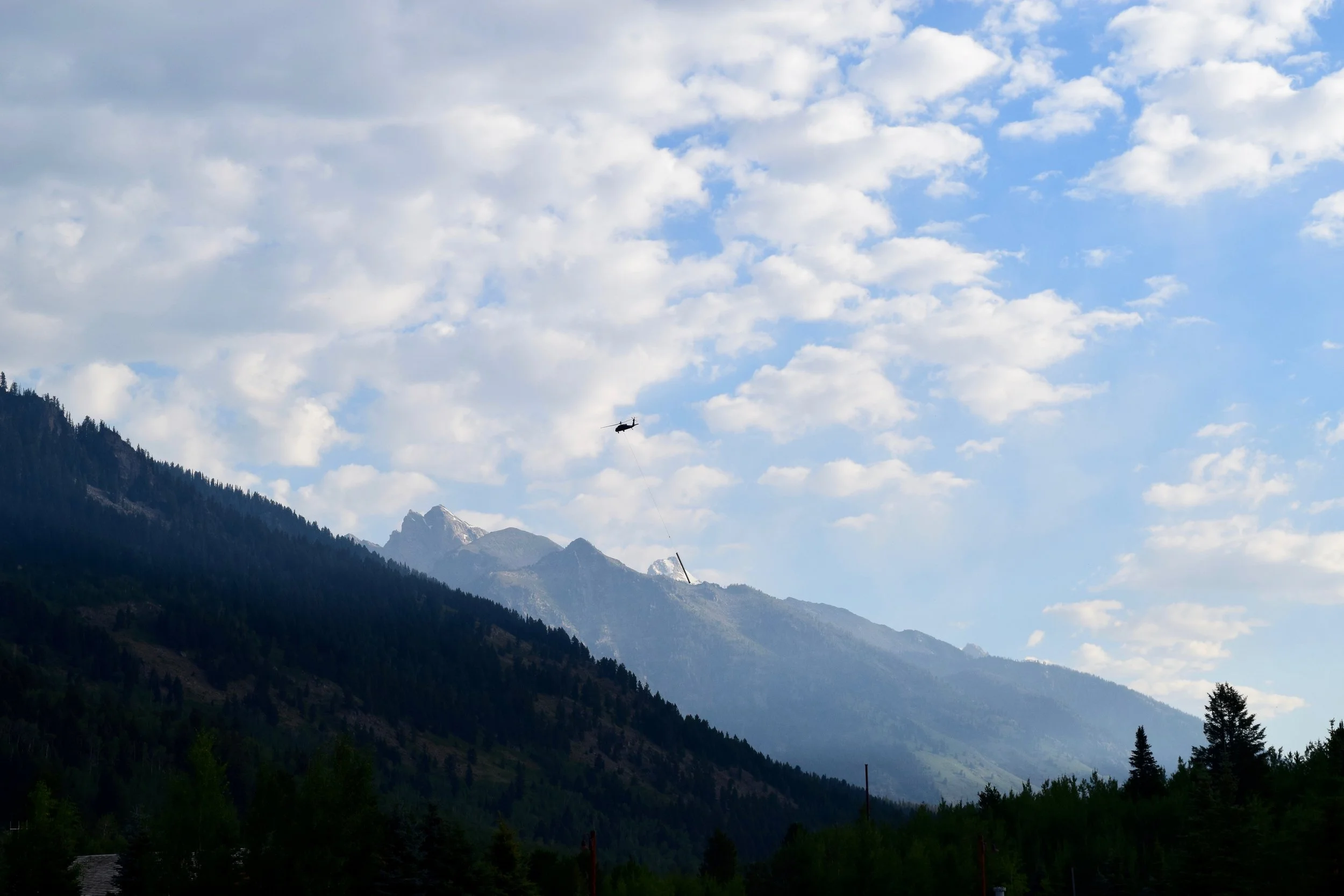 They were installing a new ski lift while we were there - this is a helicopter carrying all the different parts of the lift from the base of Teton Village to the side of the mountain. 
