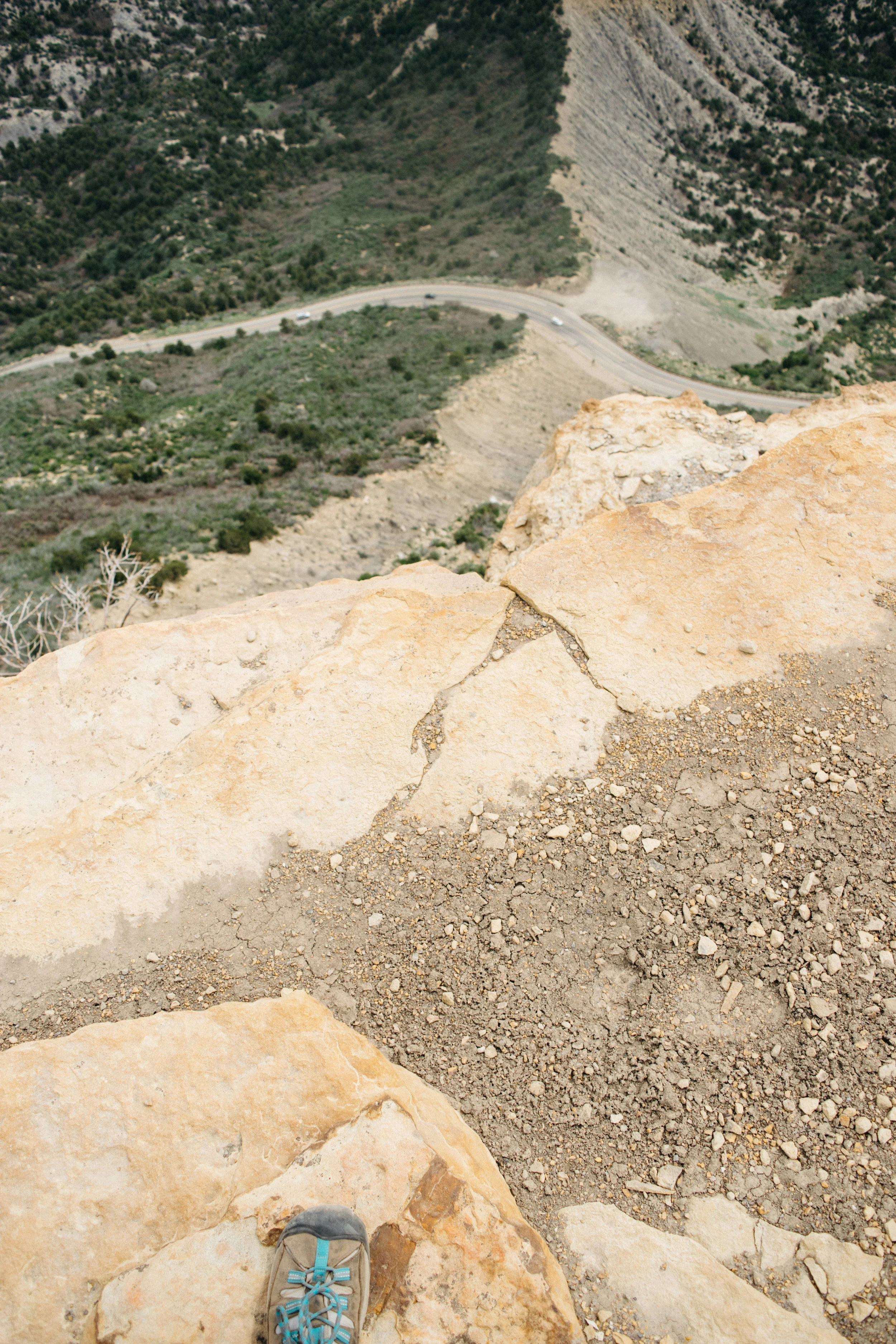 Below me is the road into the park - there's no stopping on the road because rockslides happen all the time! See 3 tiny cars for context.
