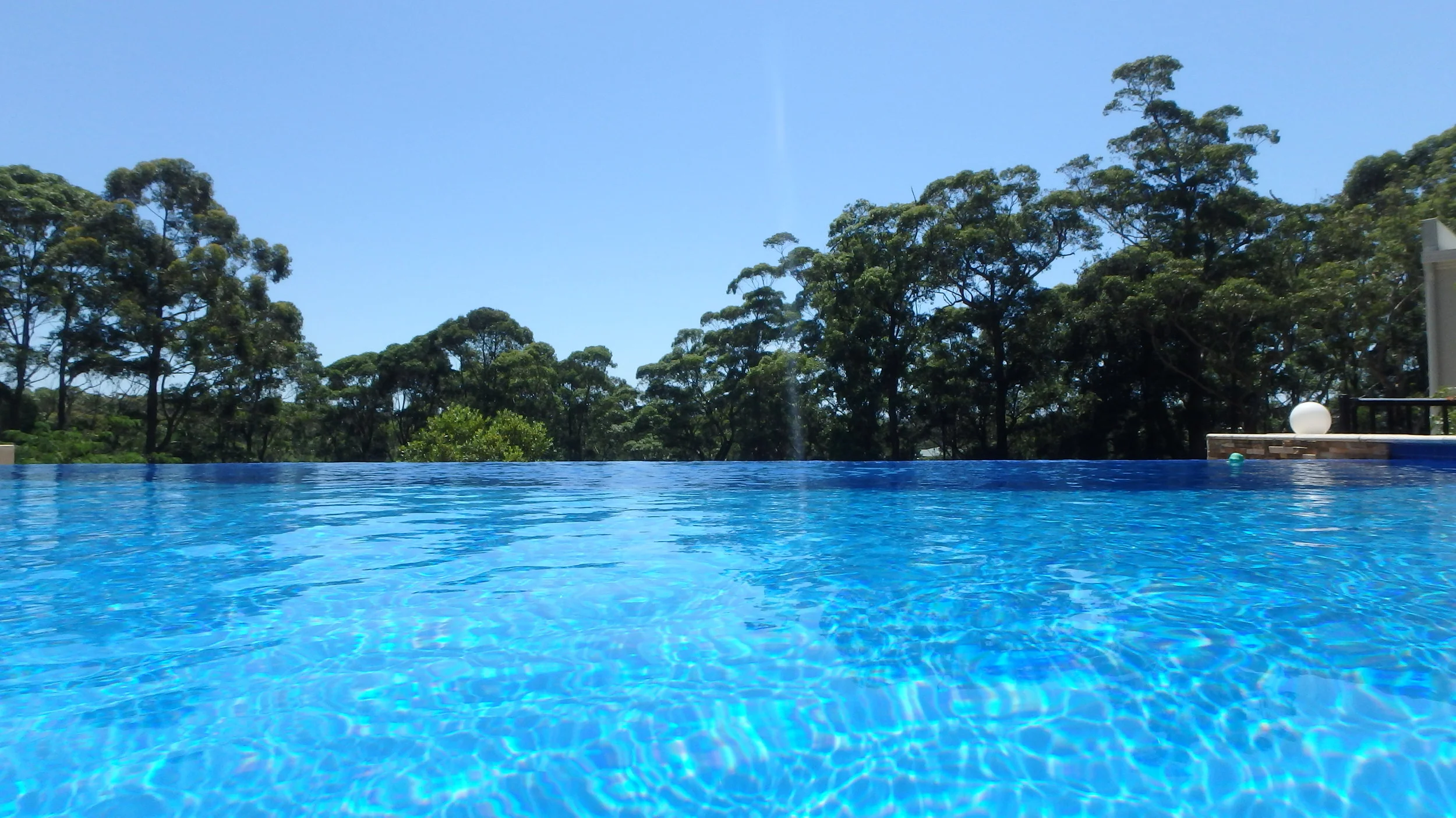 15 metre magnesium mineral heated infinity edge lap pool