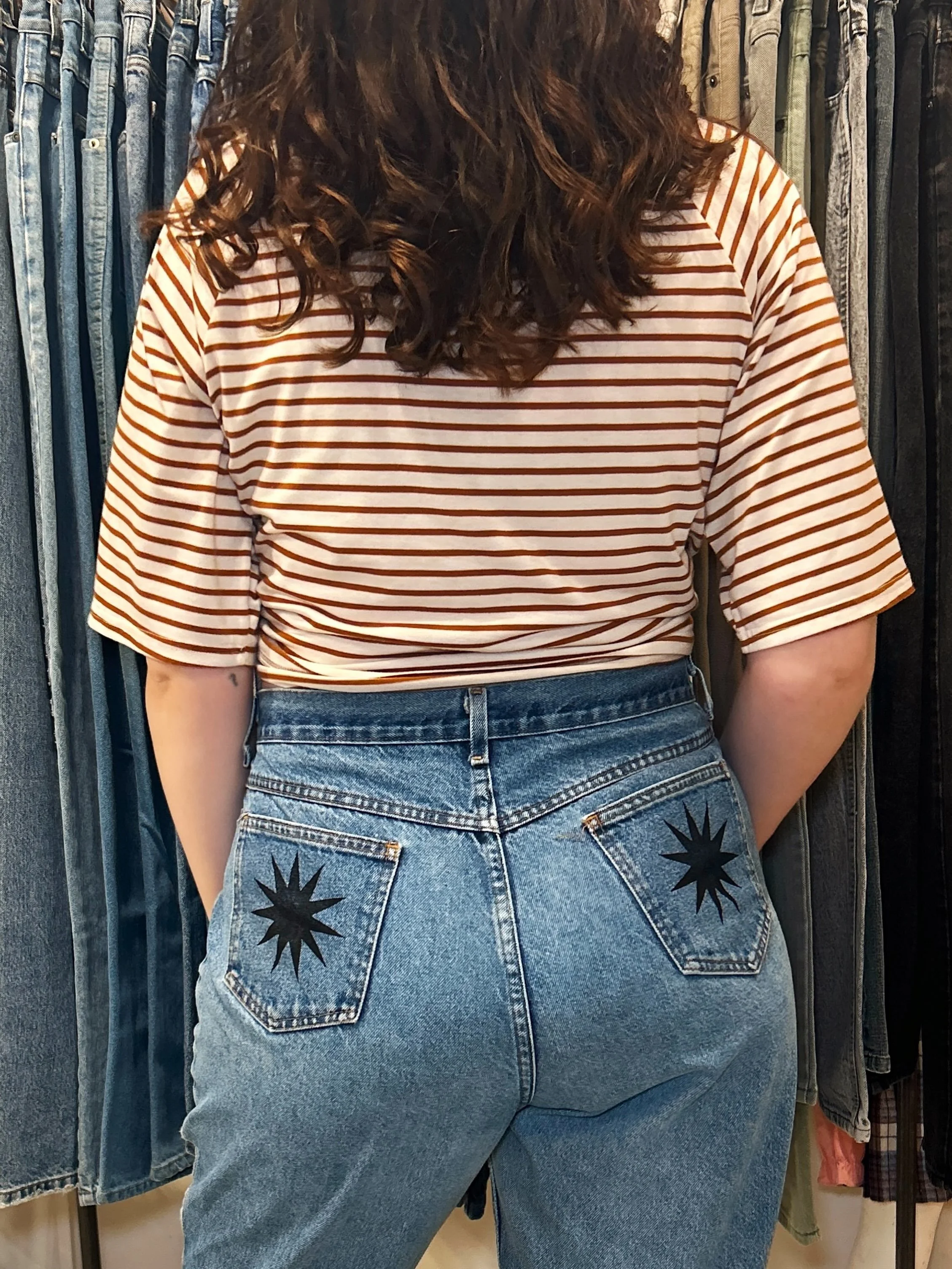 Mark your calendars - this Friday is First Friday! 🎉  Customize your jeans at our FREE denim stamping bar! (included with the purchase of jeans)👖✨ Add a little whimsy to your denim with multiple designs to choose from. Wanna BYO denim? Customize yo