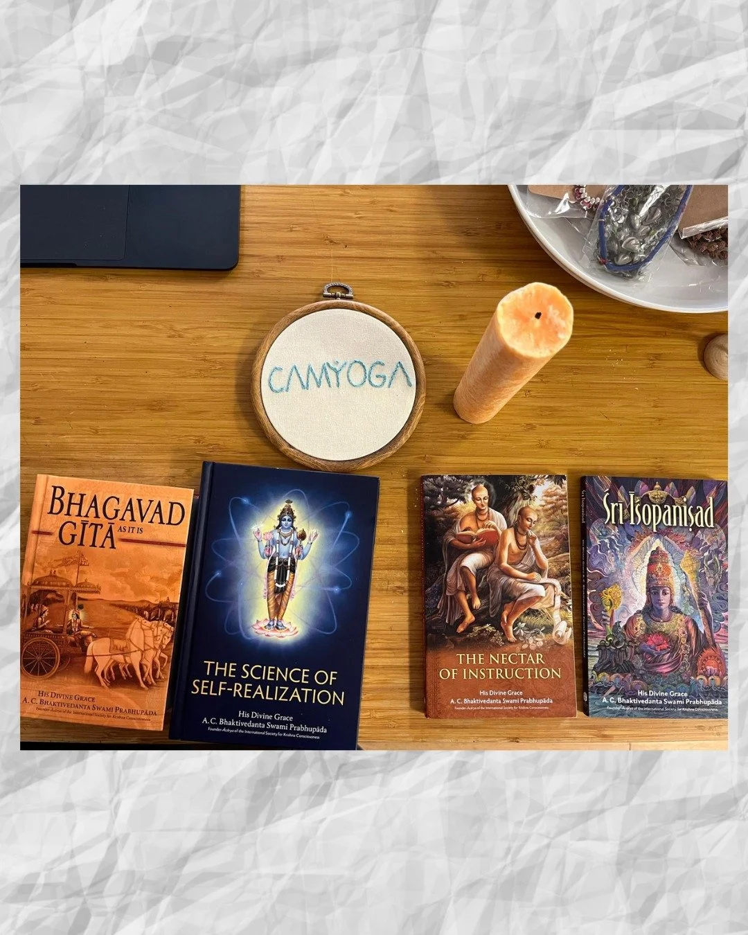 We're so touched by the beautiful and thoughtful gifts from a wonderful student, Lucia. She's leaving Cambridge, but before she goes, she's left us with this wonderful collection of yoga texts, a yellow candle, and a handcrafted embroidery of the CAM