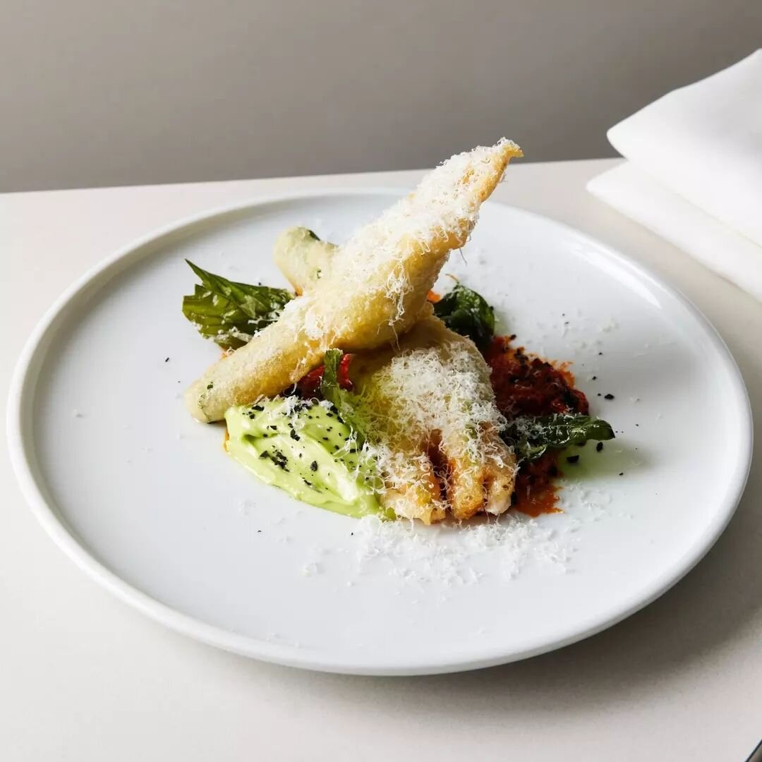 Introducing a taste of Autumn with our Fried Zucchini Flowers&mdash;crispy perfection filled with mozzarella, topped with basil aioli, pesto rosso, parmesan, and pine nuts. Experience the delicious flavours of the season with our new menu addition!