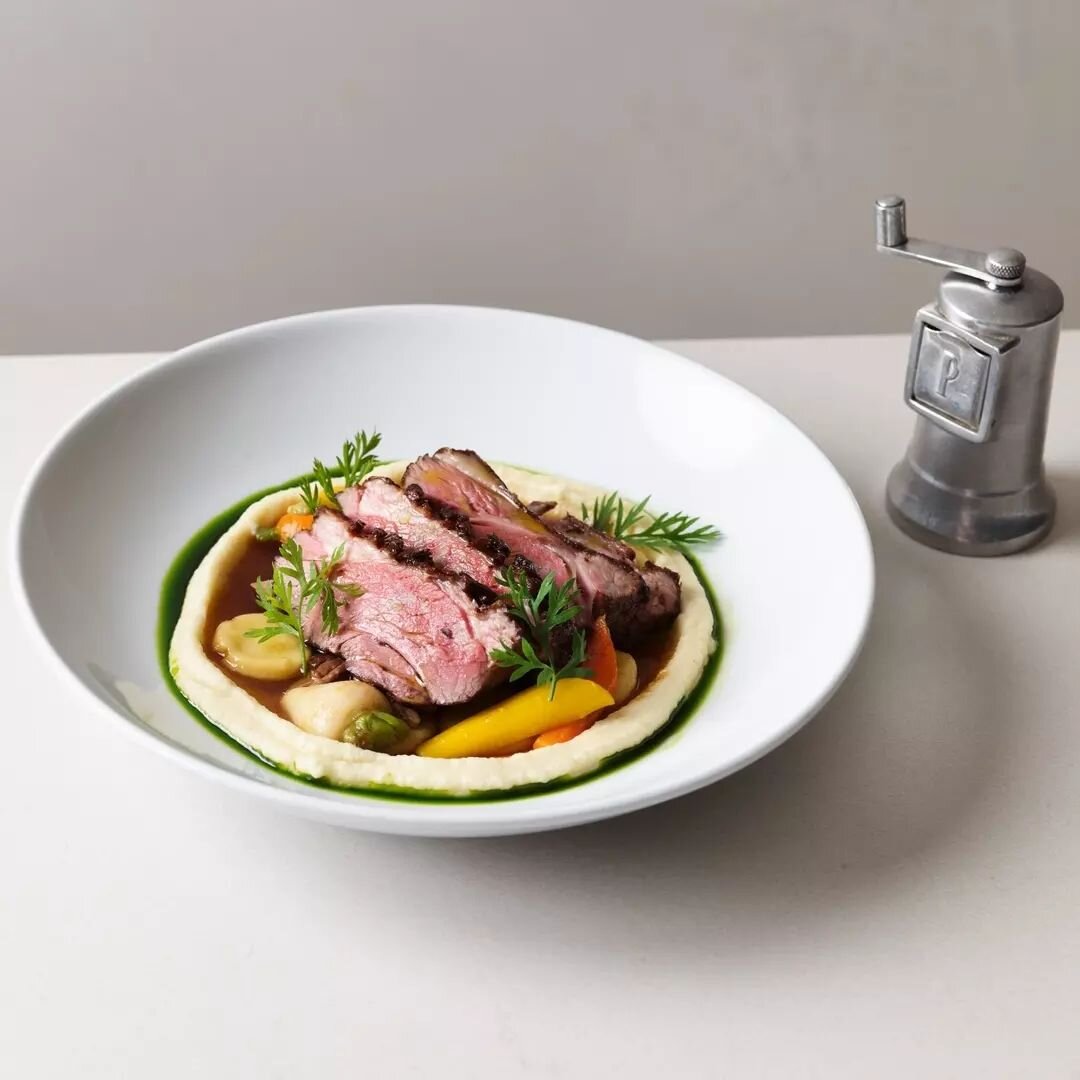 Delight in every bite with our White Pyrenees Lamb Rump. Tender braised lamb shoulder, accompanied by potato dumplings, celeriac, and a mix of vibrant heirloom vegetables, create a symphony of flavours on your plate.