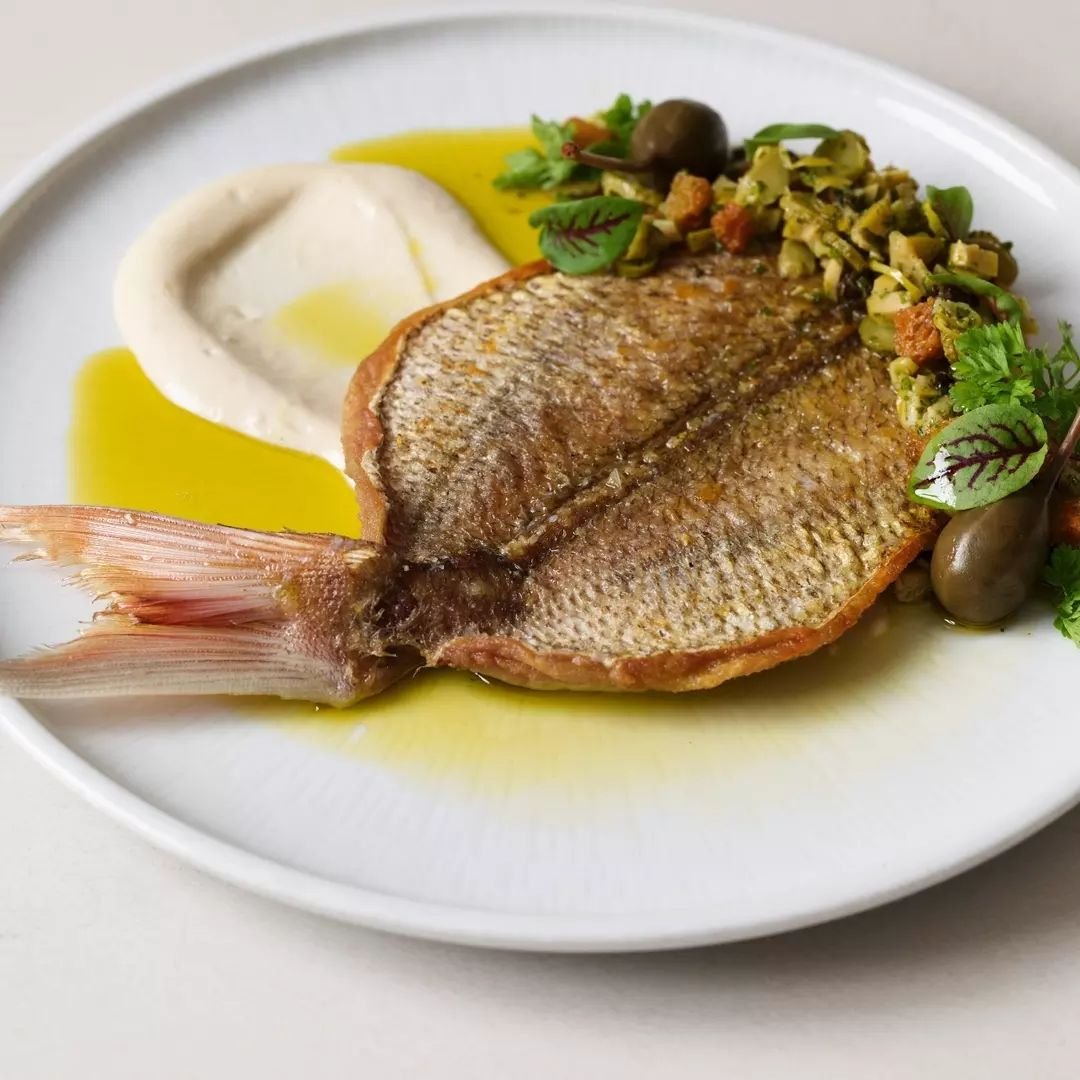 Our line caught Pan Fried NZ Snapper fillet on potato and garlic mash has been a crowd-pleasing favourite on the CATALINA menu for over 29 years. But have you tried our new Butterflied Baby NZ Snapper? This one, also line caught, is deboned and serve