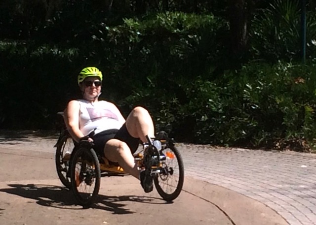 Marianne riding her Catrike three-wheel recumbent trike, Seminole Wekiva Trail, April 2014.jpeg