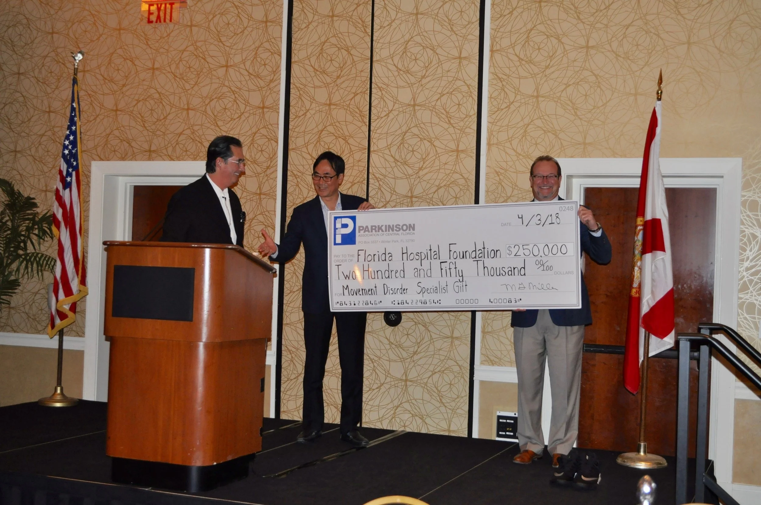 Pictured from left to right: John Gabriel, former General Manager with the Orlando Magic and PACF Board Member; Dr. Kihyeong Lee and David Collis, president at Florida Hospital Foundation. 