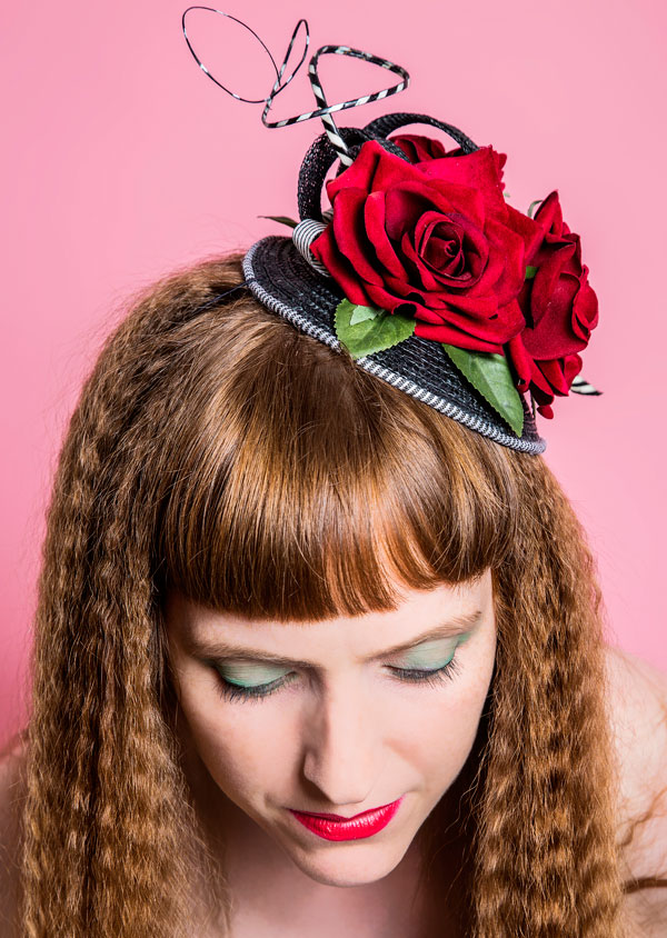 Red rose and striped quill hat