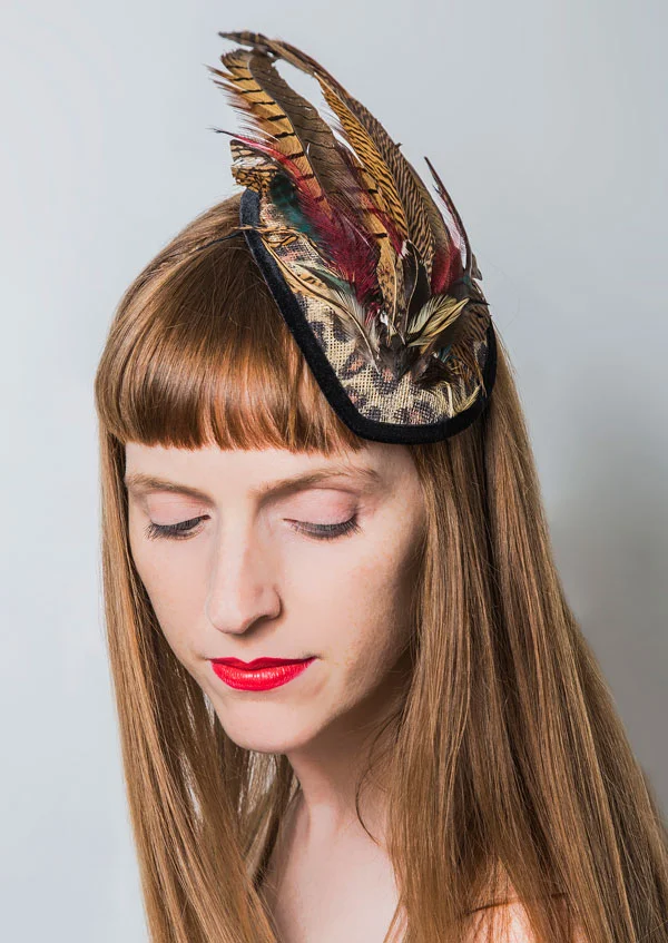 Leopard print cocktail hat with pheasant feathers