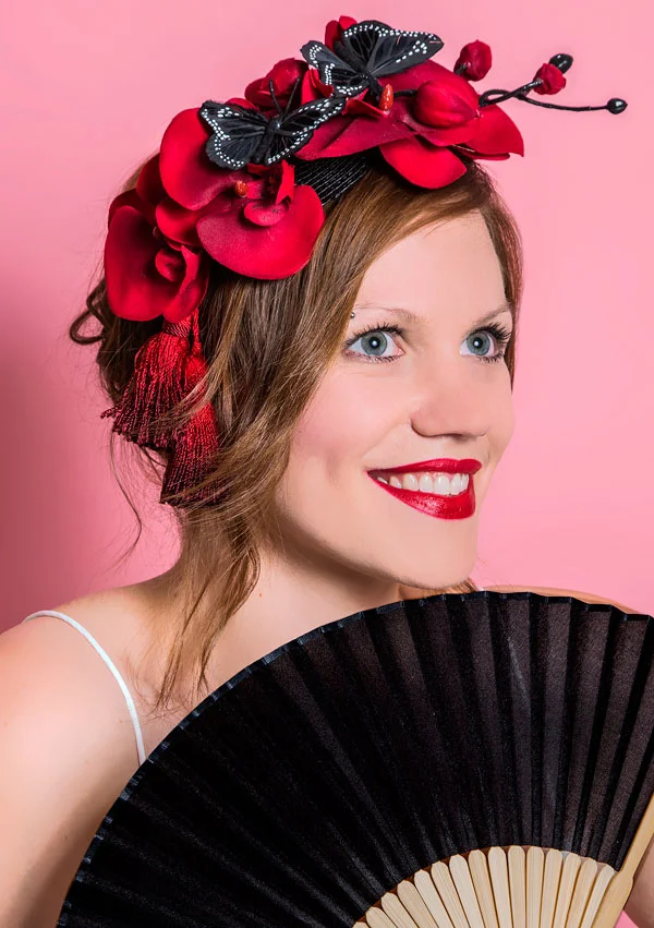 Red orchid and butterfly cocktail hat
