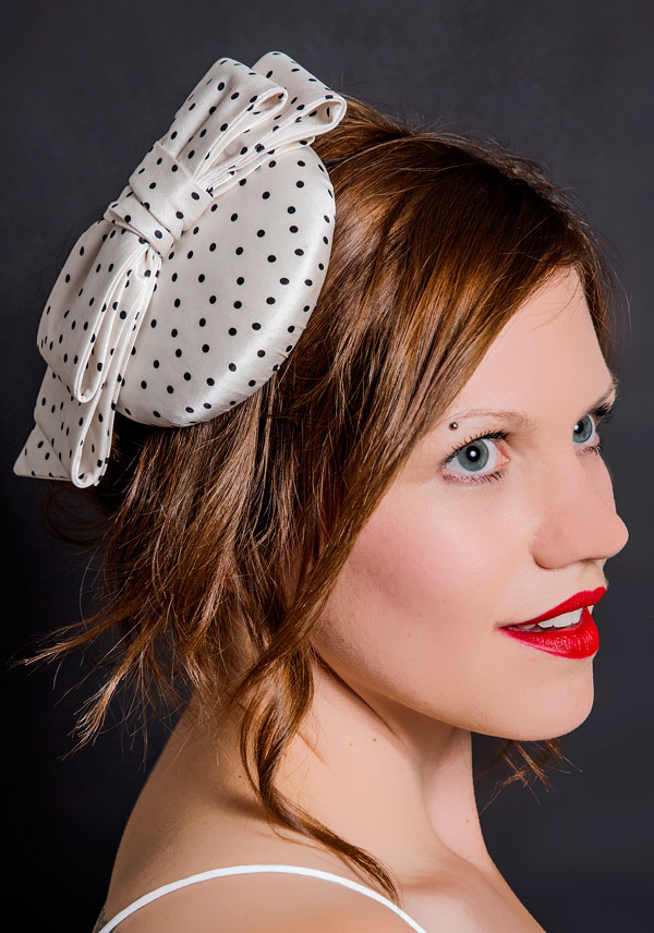 White polka dot mini hat with bow