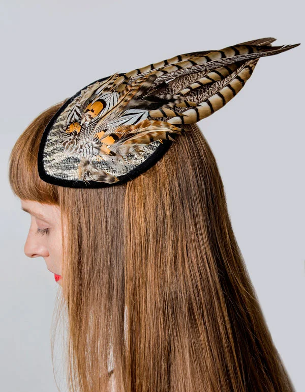 Zebra print hat with pheasant feathers