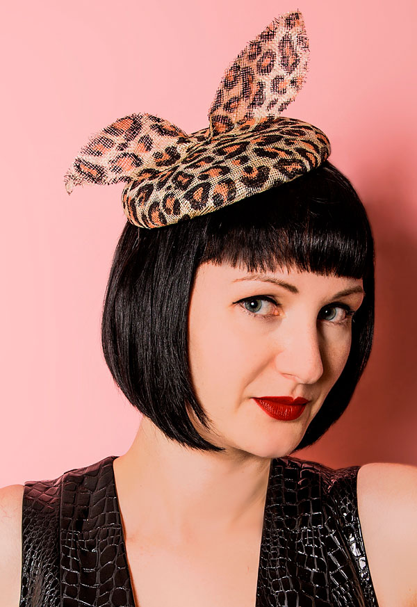 Leopard print hat with bunny ears bow