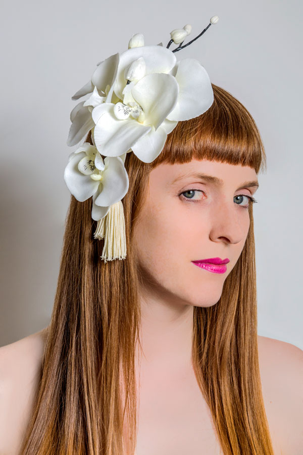 White orchid headpiece with tassels