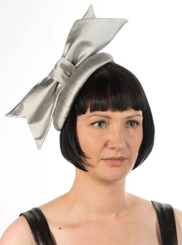 Giant silver silk bow hat