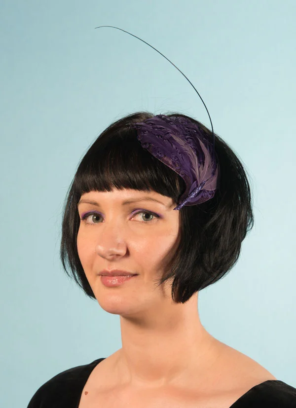 Purple feather cocktail hat with quill