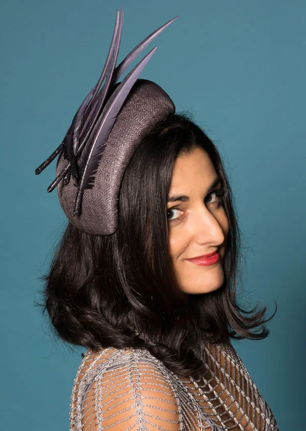 Grey occasion hat with dip-dyed feathers