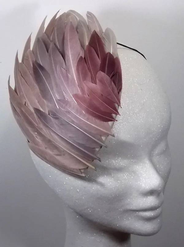 Pastel feather wing cocktail hat