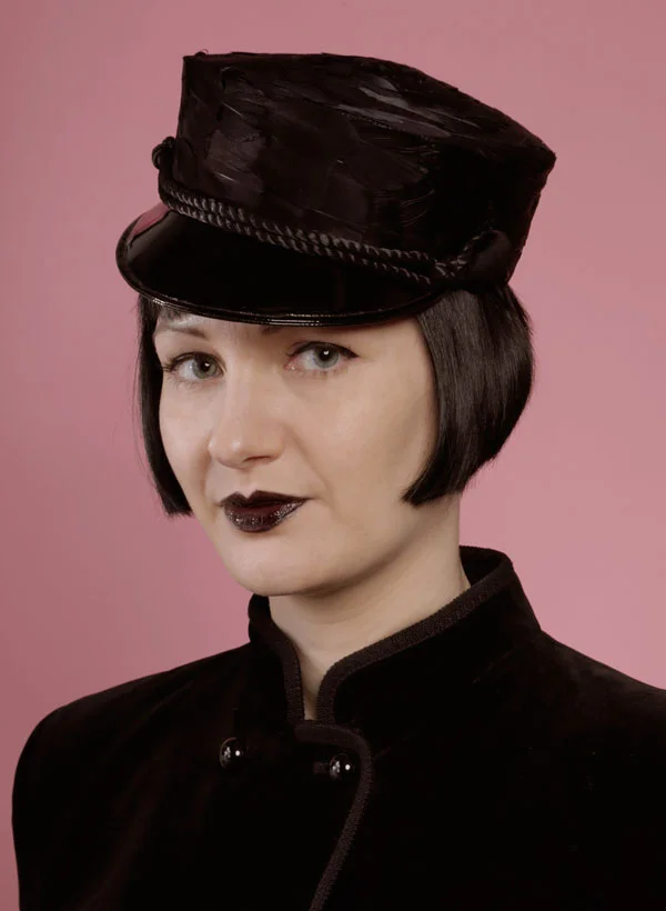 Black feather military pillbox with pvc peak