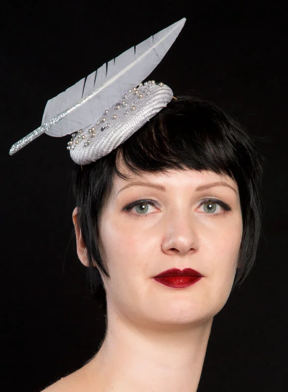 Silver straw hat with glittery feather