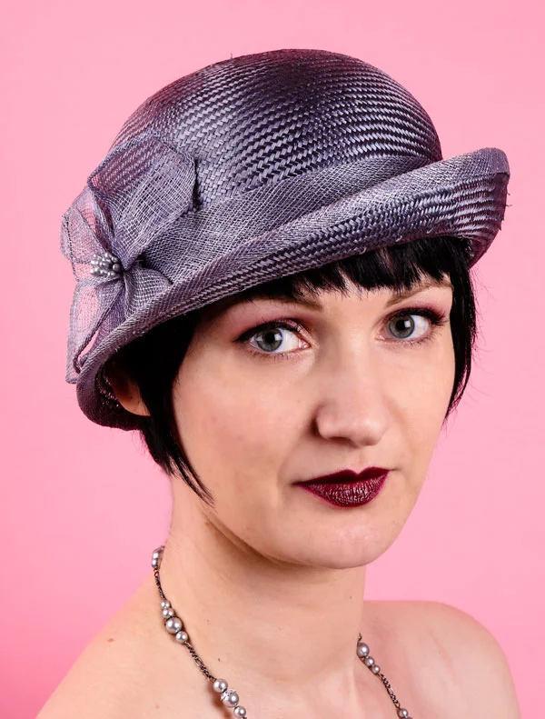 Blue-grey straw cloche with flower