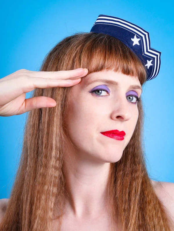 Mini navy blue sailor hat fascinator