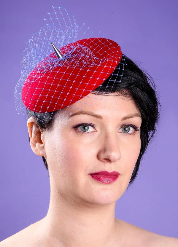 Red mini beret hat with spike and veil trim