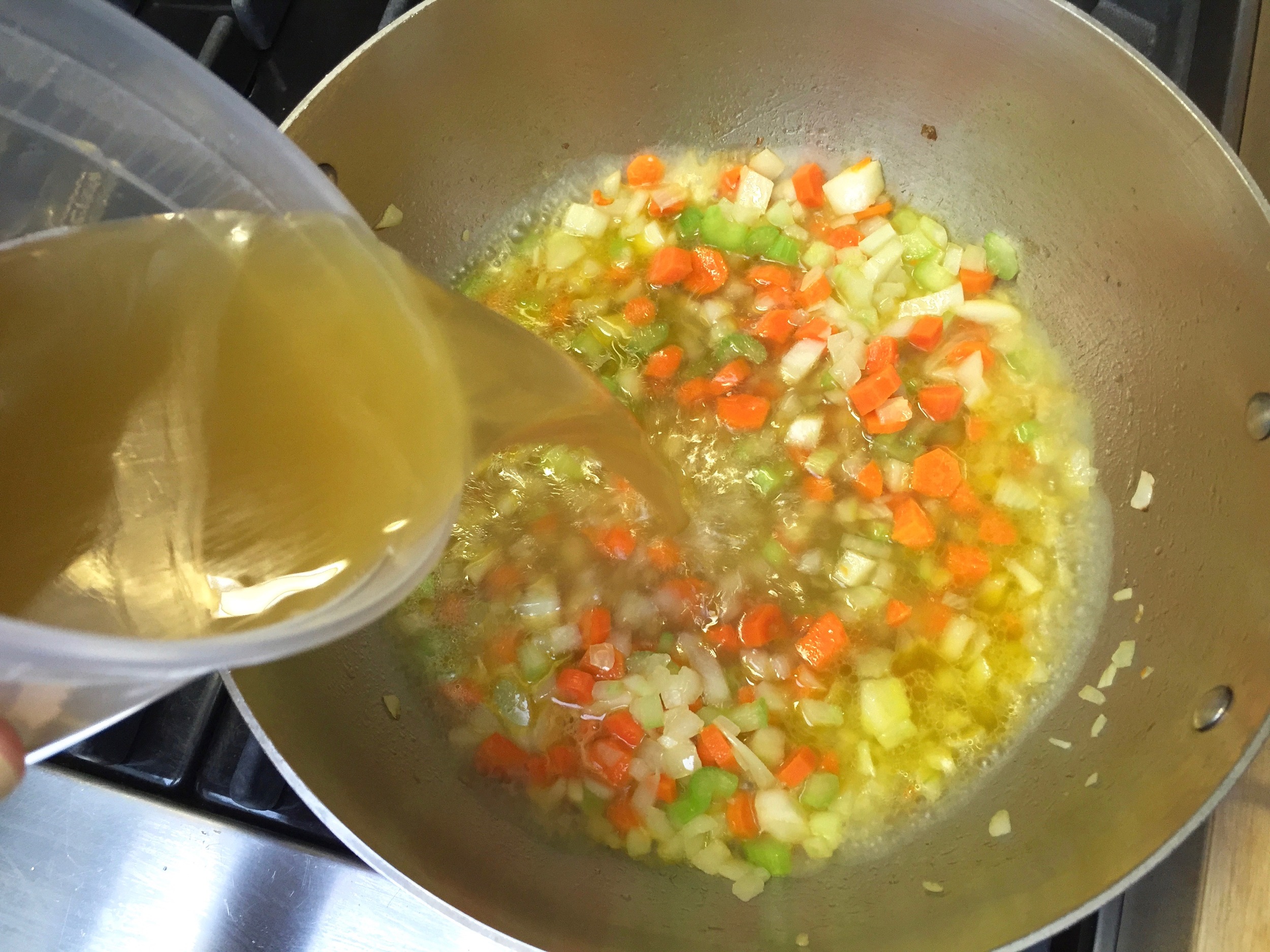 Add chicken stock and bring to a simmer, cook for 5-7 minutes more.
