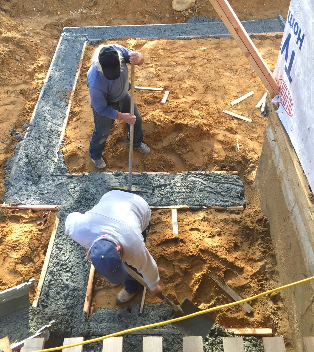 Smoothing out the cement. 