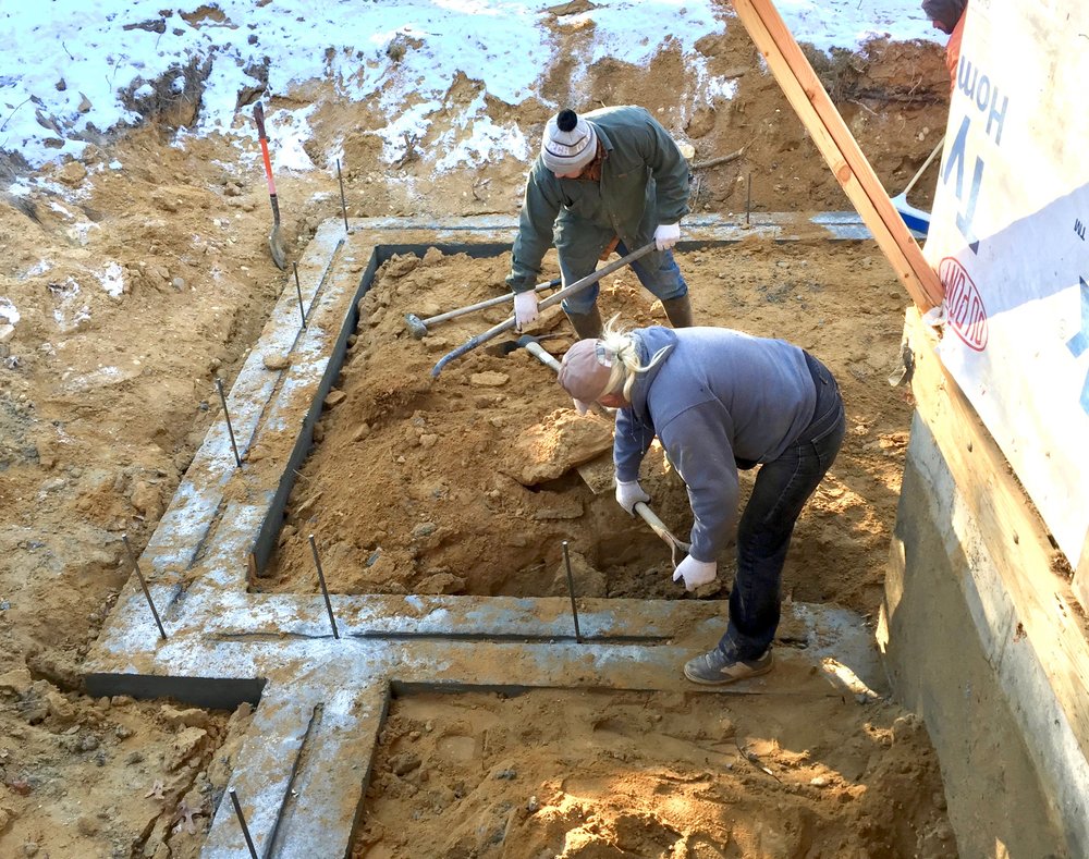 Preparing the boarders for the wall forms.