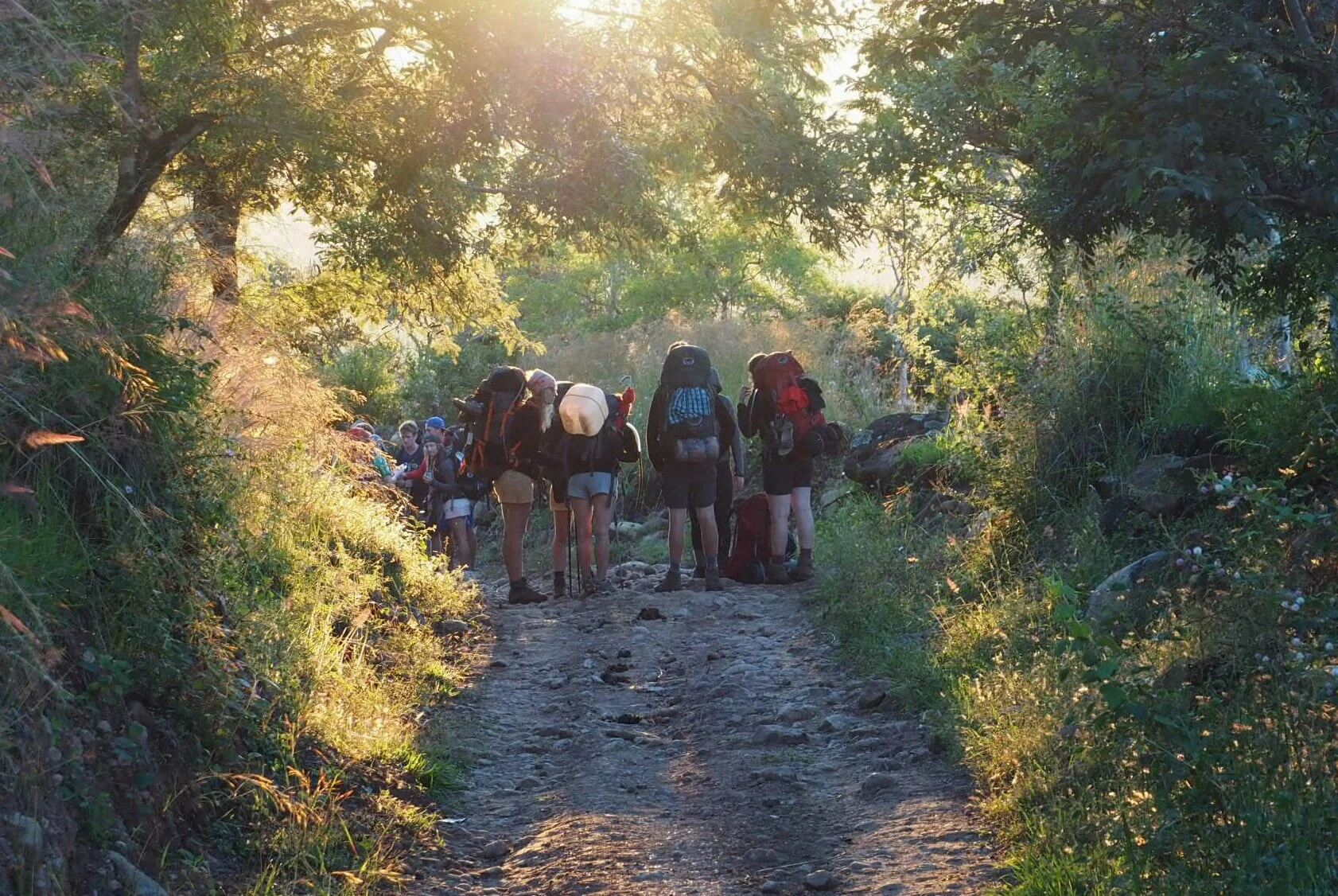 Youth, preparing to lead the way at 5:30am in the morning. Yes, we did have to carry a lot of shit, among other things three jerry cans for purifying water. They were annoying to attach to your backback, and had received indivudual names. One was called Gary.