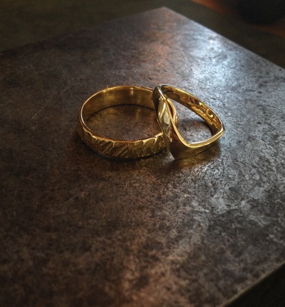 18K gold his and her's wedding bands