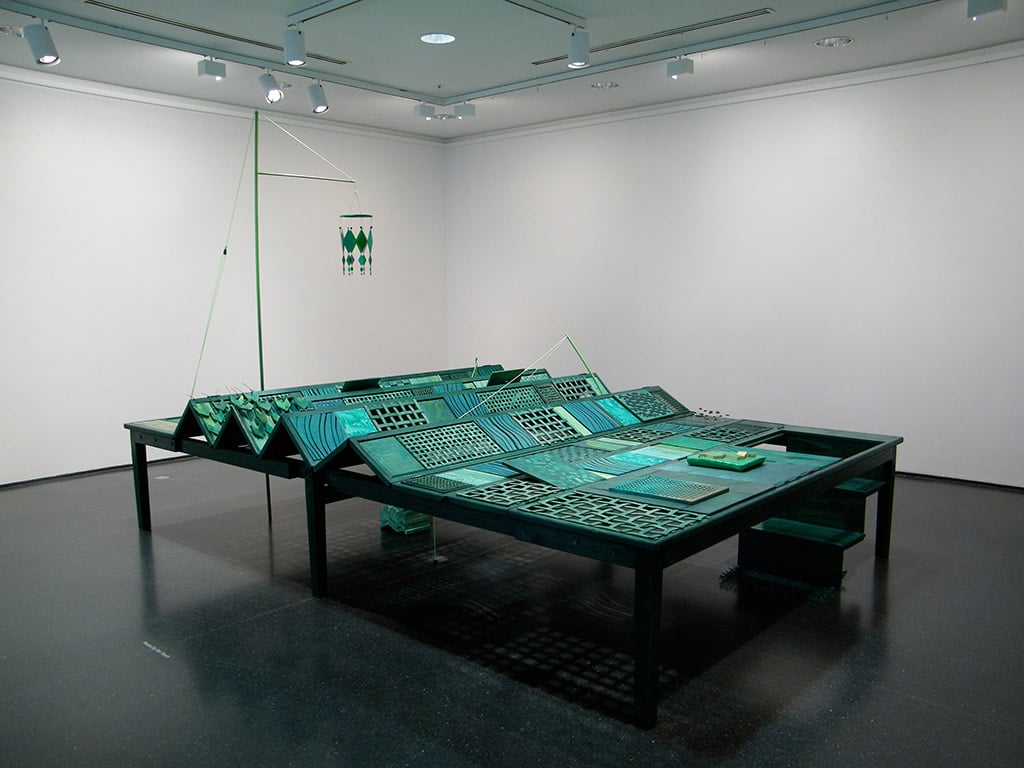 Patchwork Plateau, 2011 Plywood, red oak, fiberboard panel, plastic, acrylic, glass, sand, beads, wire, nylon rope, spray-paint, colored pencil, and hardware. Approx. 168 x 96 x 72 in.